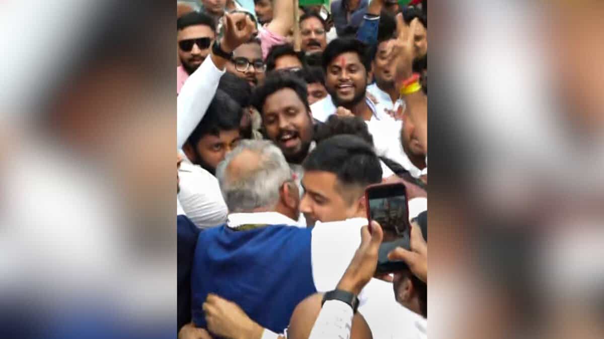 Chaitanya Baghel being greeted by his father, former Chhattisgarh chief minister and Congress leader Bhupesh Baghel, following his release from Raipur jail after the Chhattisgarh High Court granted him bail in two cases linked to the alleged liquor scam in the state, in Raipur, Saturday, Jan. 3, 2026. (PTI Photo)