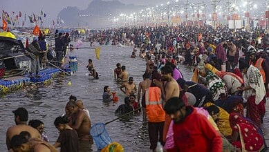 Devotees taking dip in Sangam on the occasion of 'Makar Sankranti' festival