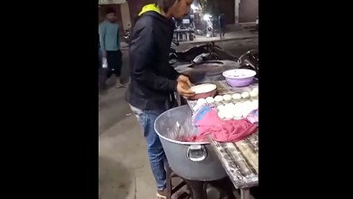 cook spitting on dough