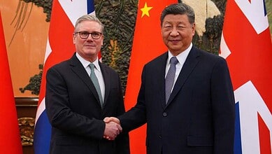 Britain's Prime Minister Keir Starmer, left, shakes hands with Chinese President Xi Jinping ahead of a bilateral meeting in Beijing, China, Thursday, Jan.29, 2026.
