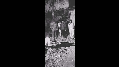 Police officials at the murder cite