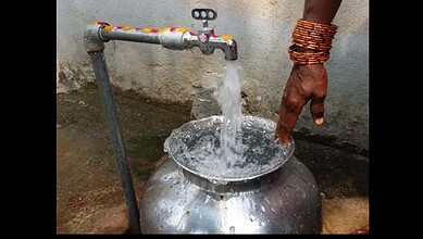 An image of a person filling water used for representational purpose