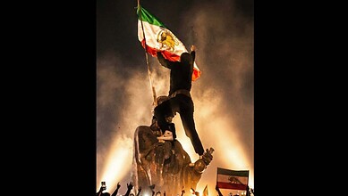 A man takes part in protest in Iran