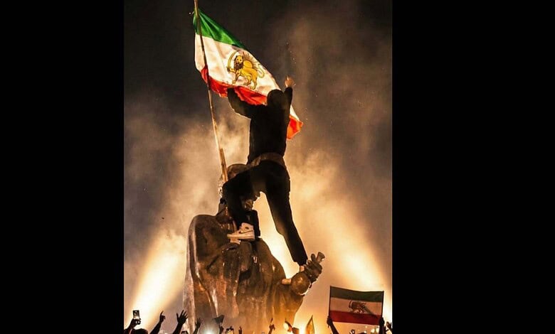 A man takes part in protest in Iran