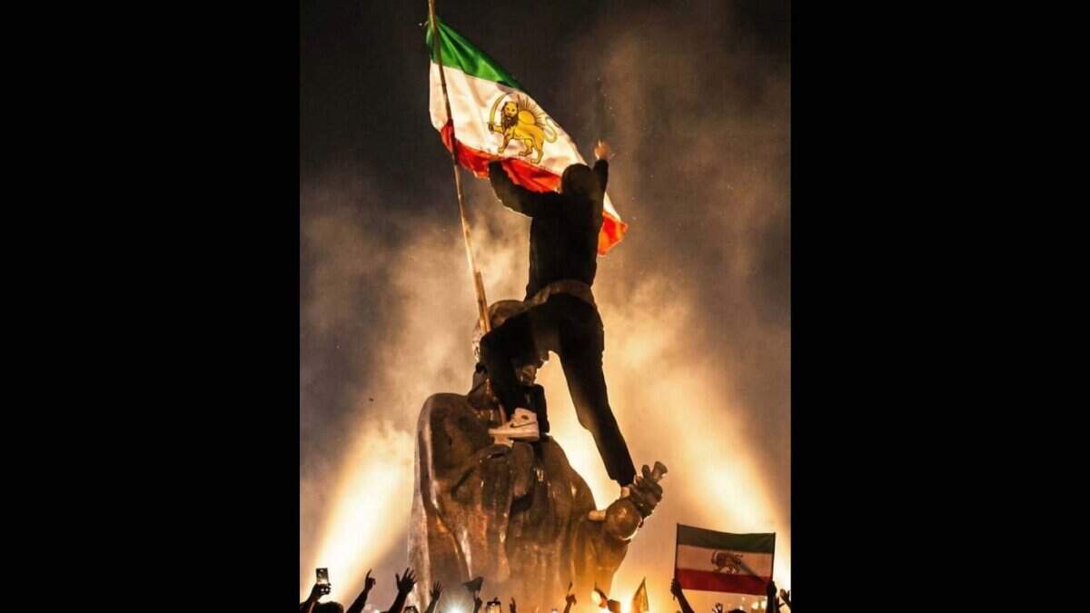 A man takes part in protest in Iran