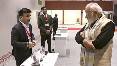 Prime Minister Narendra Modi visits an exhibition during a programme marking a decade of the Startup India initiative, in New Delhi.