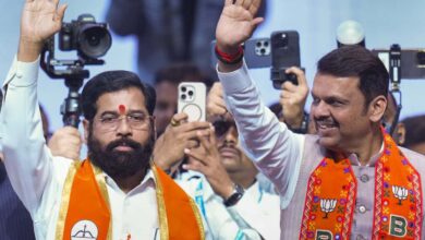 Maharashtra Chief Minister Devendra Fadnavis, right, with Deputy CM Eknath Shinde during the campaign in Mumbai.