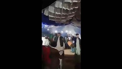 People dance at a wedding in Pakistan moments before the blast