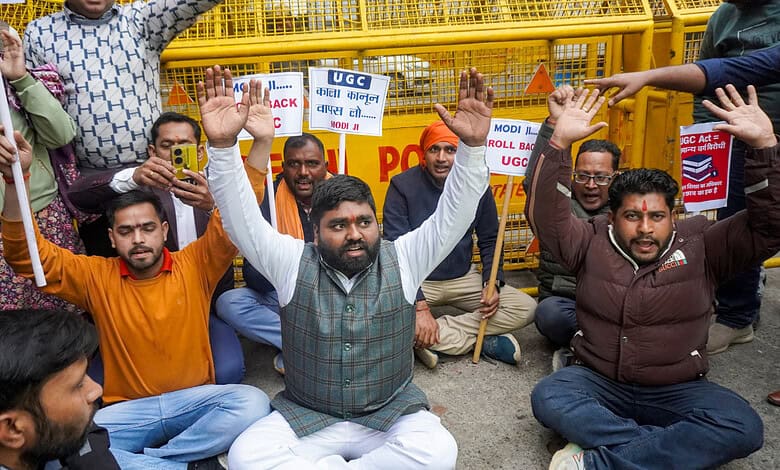 People from upper caste communities stage a protest outside the University Grants Commission headquarters, saying that the new regulations issued by the commission could lead to chaos on campuses