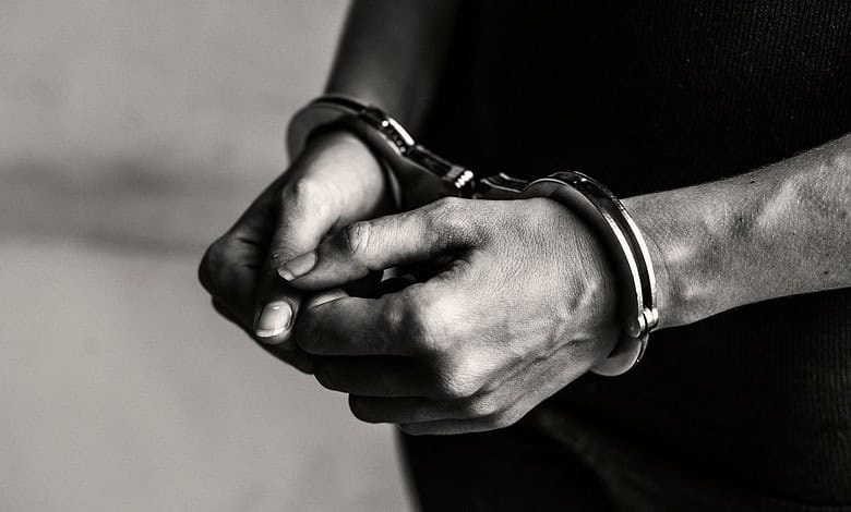 handcuffed hands