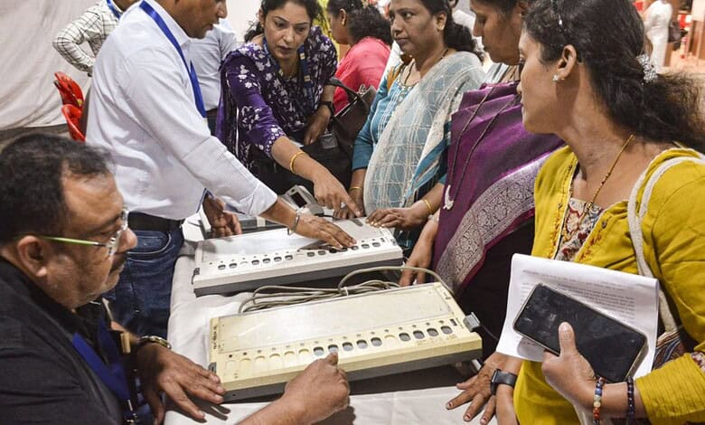 Polling officials take part in a training session on Electronic Voting Machines (EVMs) in Thane, Maharashtra.