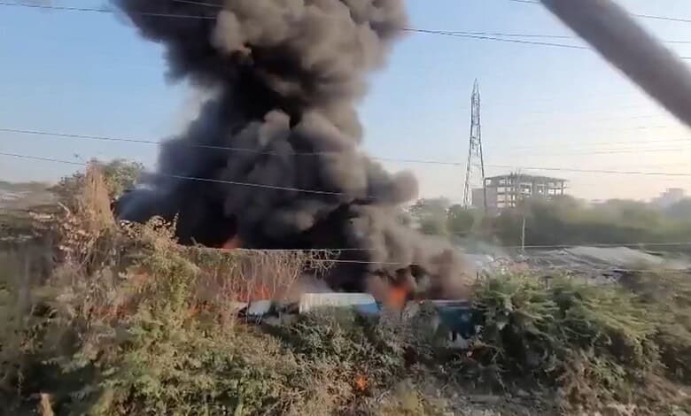 Smoke coming out of the dump yard near Musi river