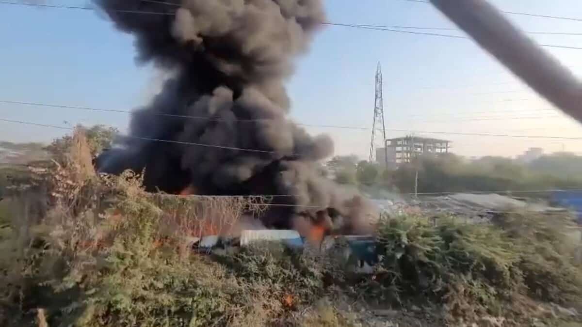 Smoke coming out of the dump yard near Musi river
