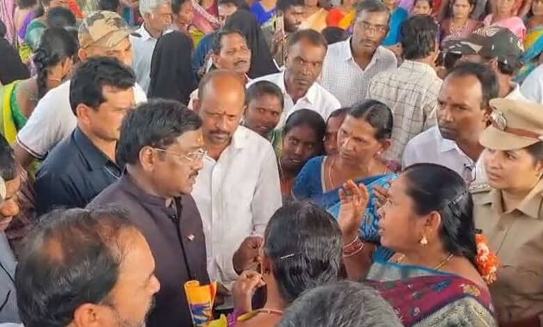 Telangana Mimnister G Vivek is confronted by women