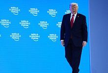 President Donald Trump arrives on stage to address the audience during the Annual Meeting of the World Economic Forum in Davos, Switzerland, Wednesday (AP)
