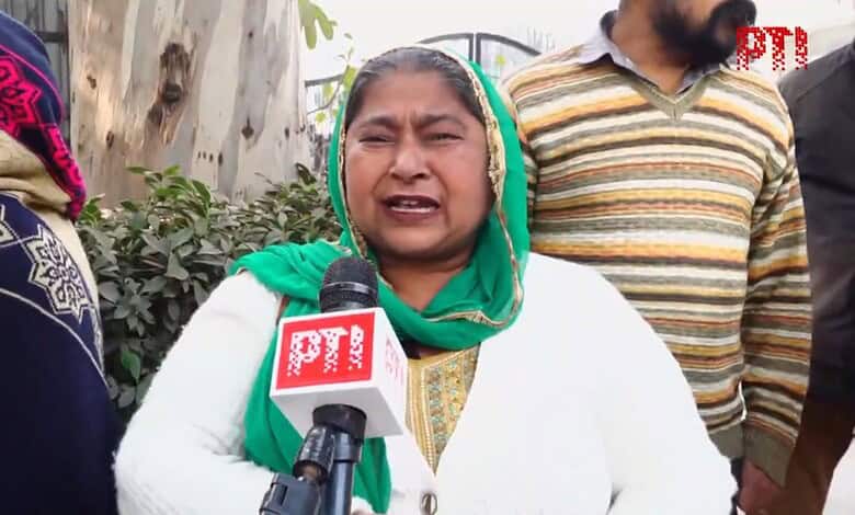 A woman speaks to the media after acquittal of 1984 riots accused Sajjan Kumar