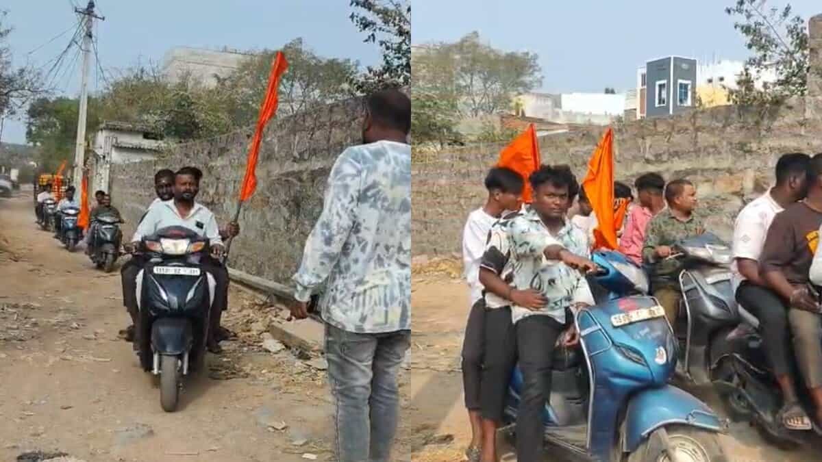 Participants of Dharma Raksha Sabha rally carrying saffron flags in Balapur