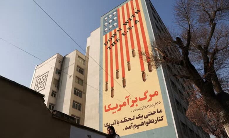 An anti-.US mural on a building in Tehran, Iran says ‘Down with the USA’ (via REUTERS)
