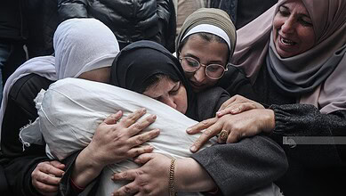 A woman weeps after the death of her Child due to Israeli Air Strike in Gaza