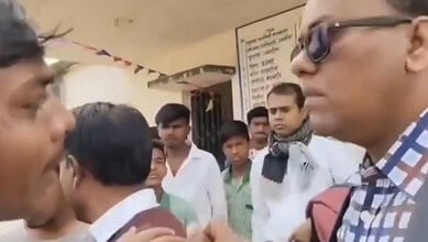 A boy argues with a teacher objecting the participation of Hijab-clad students during a Republic Day celebration in Jharkhand