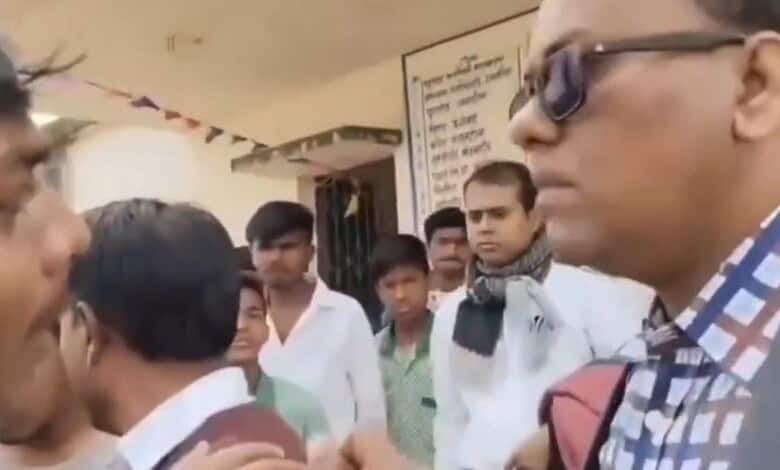 A boy argues with a teacher objecting the participation of Hijab-clad students during a Republic Day celebration in Jharkhand