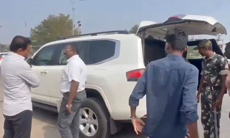 BRS Working Presdent KTR looks on as officials check his vehicle