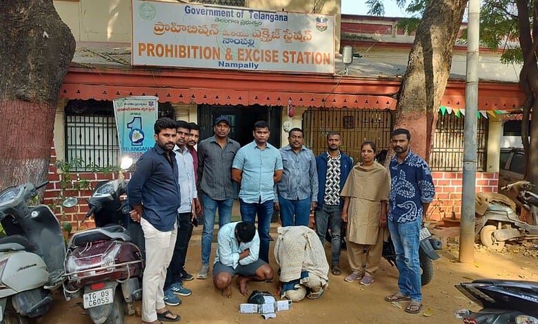 Police arresting two people for allegedly selling Ganja in Hyderabad.