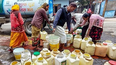 Bhagirathpura residents fill water from tankers being supplied by the local authorities in Madhya Pradesh's Indore.