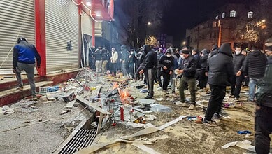 Protesters in Tehran's Grand Bazaar over failing economic policies.
