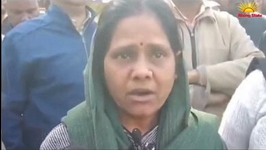 Kashmiri youth assault accused Sanjay Yadav's wife Reena speaking to reporters (Source: X)