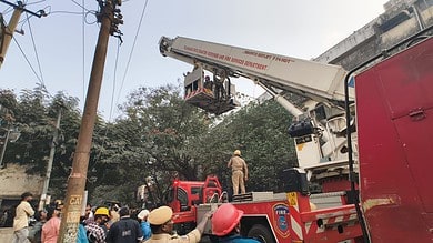 Fire officials conduct rescue operation at Nampally