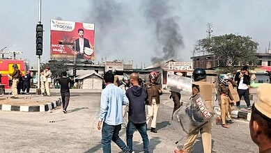 Kokrajhar: Security personnel at the site after clashes erupted allegedly between Bodos and Adivasis, a day after mob violence left one person dead, in Assam's Kokrajhar, Tuesday, Jan. 20, 2026. (PTI Photo)