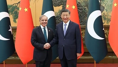 Pakistan Prime Minister Shehbaz Sharif (left) with Chinese President Xi Jinping (right)