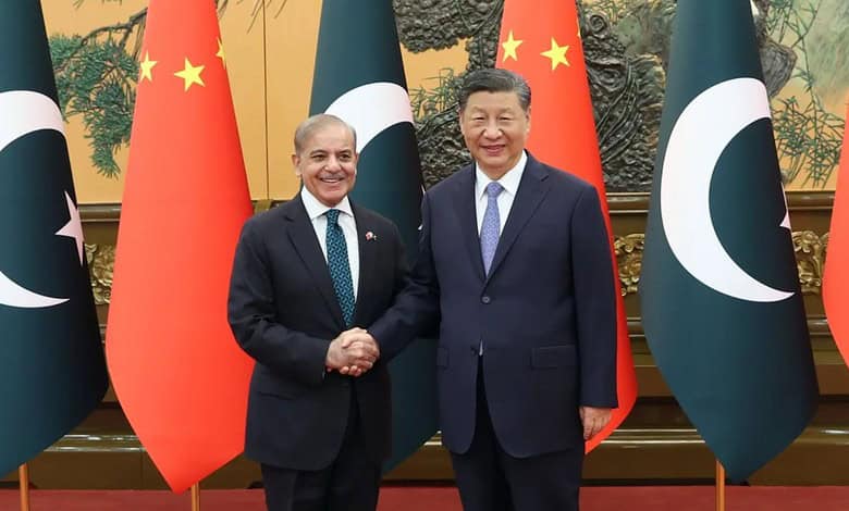 Pakistan Prime Minister Shehbaz Sharif (left) with Chinese President Xi Jinping (right)