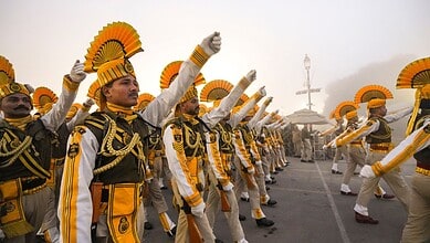 Indian naval band performs during rehearsals amid dense fog on a cold winter morning ahead of the Republic Day Parade, in New Delhi, Friday, Jan. 16, 2026. (PTI Photo/Kamal Kishore)