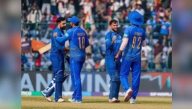 Afghanistan's Azmatullah Omarzai and Mohammad Nabi celebrate the win during the ICC Men's T20 World Cup 2026 cricket match between Afghanistan and UAE in New Delhi on Monday, February 16.