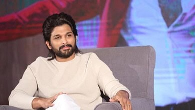 Allu Arjun speaking at a press event about legal action against false allegations.