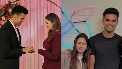 Wedding couple exchanging rings at a celebration event.