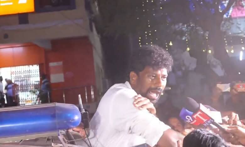 BRS leader Balka Suman being detained after attacking Congress minister's convoy.