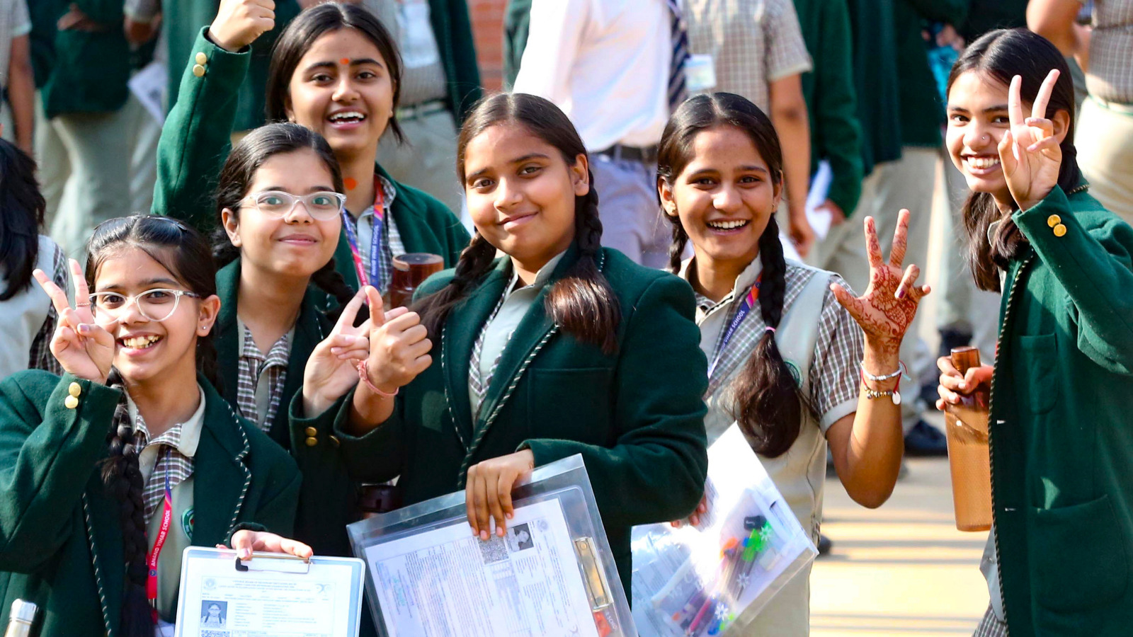 Students queue up outside an examination centre as the Central Board of Secondary Education (CBSE) Class 10 and 12 board examinations commence. (Source: PTI)
