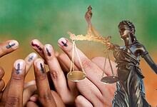 Justice and equality symbol with hands and scales of justice.
