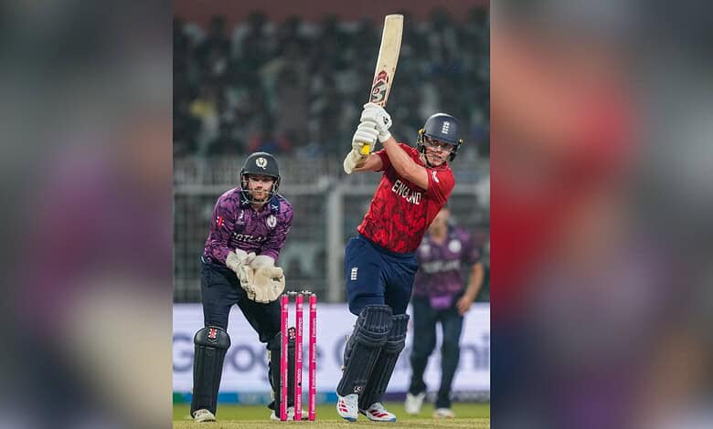 England cricket player batting during a match against Scotland in the T20 World Cup.