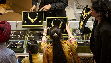 Customers at a jewellery shop on the occasion of the Dhanteras festival, in New Delhi, Saturday, Oct. 18, 2025.
