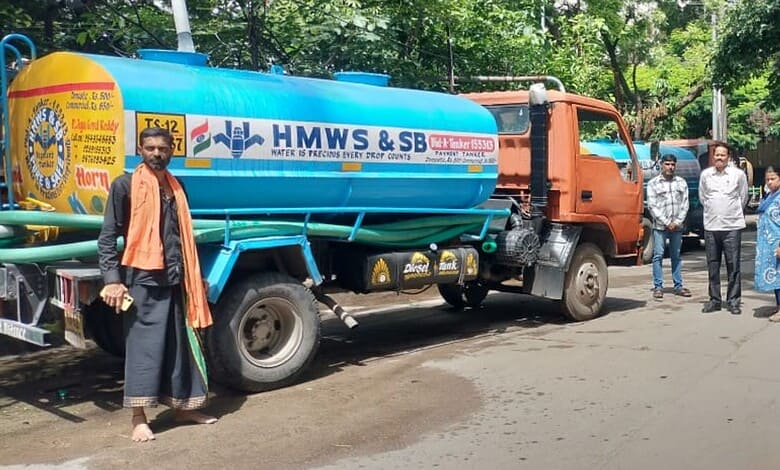 Image shows an HMWSSB tanker truck parked on the street