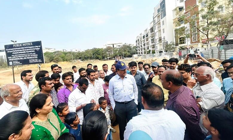 Group of officials and locals discussing the new government college project in Kondapur.