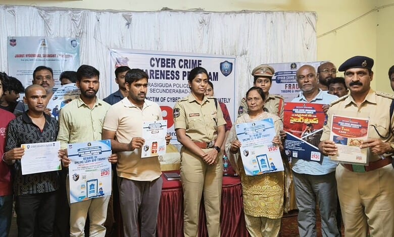 Hyderabad Police officers and civilians participating in a cyber crime awareness event.