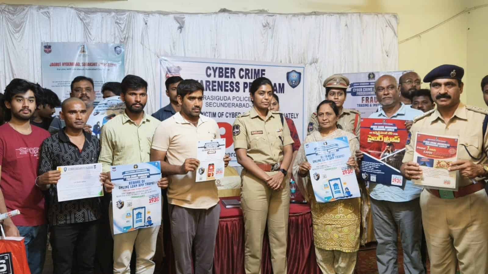 Hyderabad Police officers and civilians participating in a cyber crime awareness event.