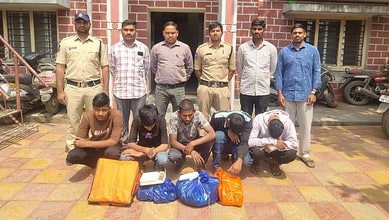 Hyderabad Excise Department officials display seized ganja weighing 9.5 kg after citywide raids.