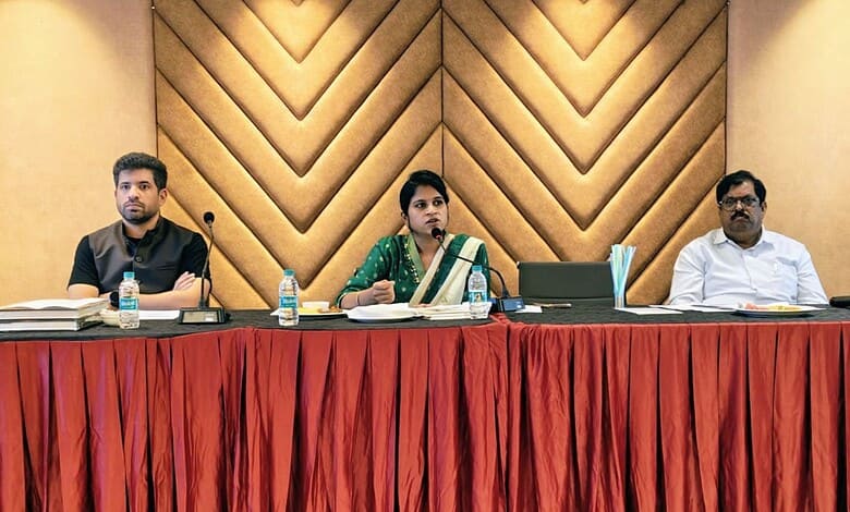 Telangana medical tourism conference with healthcare professionals discussing medical travel options.