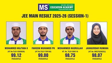Group of three male students from MS Education Academy celebrating JEE Main 2026 results.